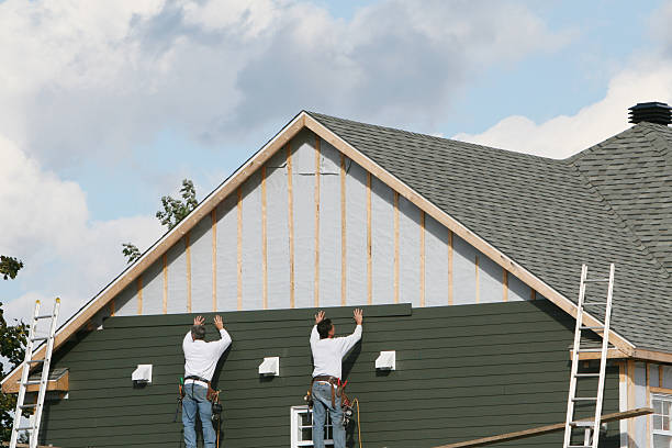 Professional Siding technician working in Greenville, IN